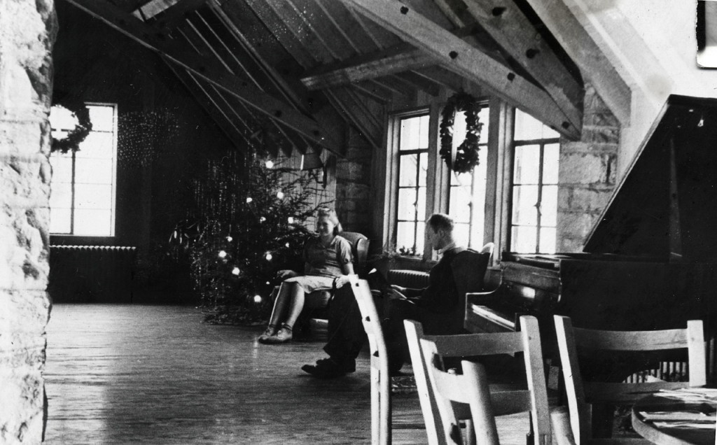 John Spelman seated in Laurel House interior at Christmas., c. 1938. X_100_workers_2562a_mod.jpg