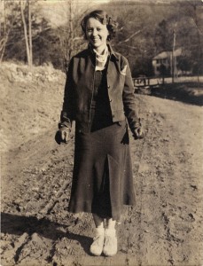 Susie Hall Angel on PMSS campus road, 1935. Schoolhouse I in background.